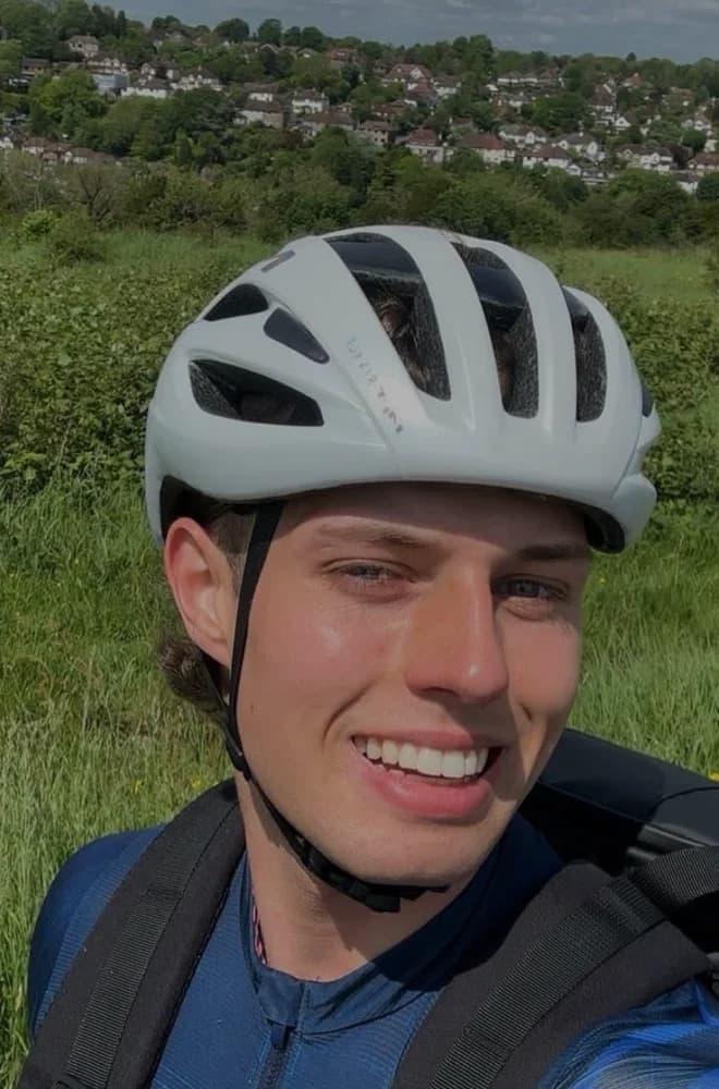An AMA member cycling outdoors